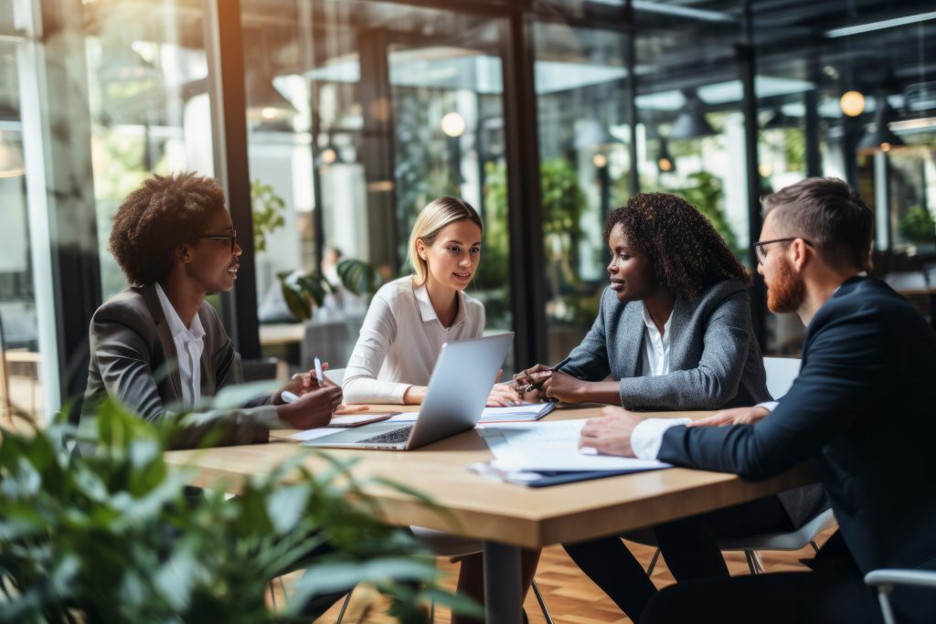 group of multiethnic business people working and communicating together in office